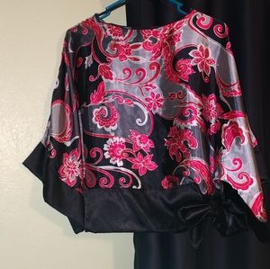 Uno Core U.S.A. blouse. Gorgeous sleeves. 100% Polyester. Feels silky.